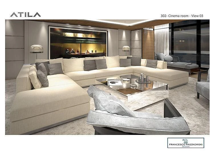 a living room with a couch and a coffee table aboard ATTILA Yacht for Sale