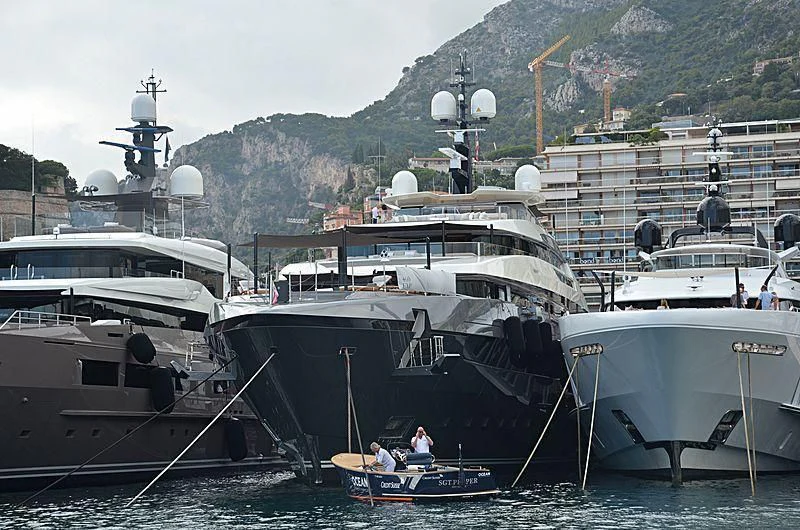 boats docked at a pier aboard ATTILA Yacht for Sale