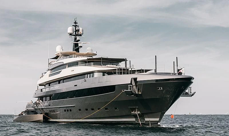 a large ship in the water aboard ATTILA Yacht for Sale