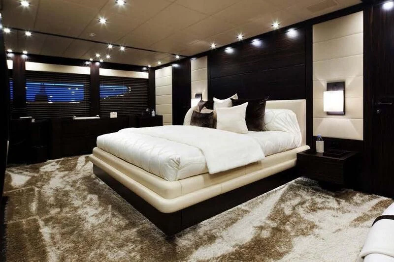 a bed in a room aboard GENESIS Yacht for Sale