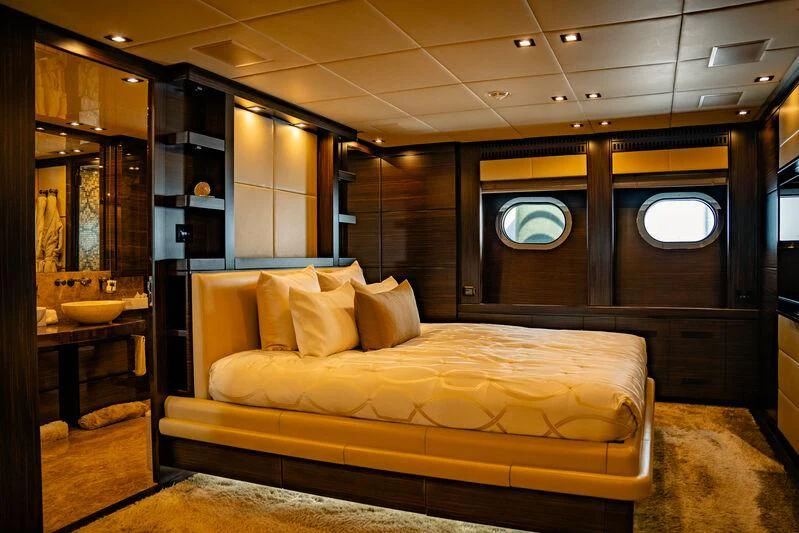 a bed in a room aboard GENESIS Yacht for Sale