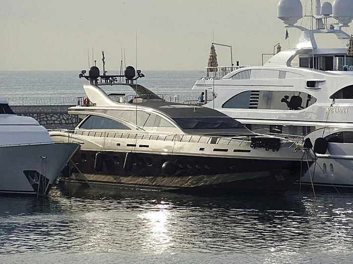 several boats docked at a pier aboard GENESIS Yacht for Sale