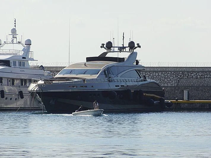 a large boat docked at a port aboard GENESIS Yacht for Sale