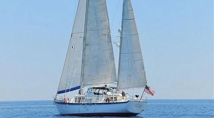 a sailboat on the water aboard WHITE EAGLE Yacht for Sale