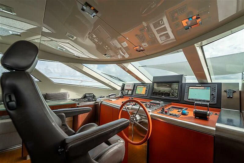 inside of a vehicle with computers and monitors aboard ADAMO Yacht for Sale