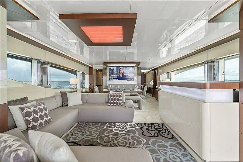 a living room with a large window aboard ADAMO Yacht for Sale