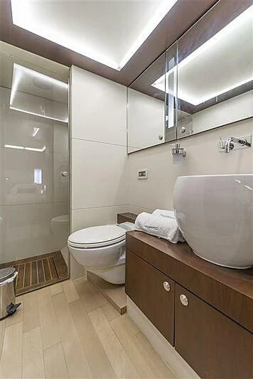 a bathroom with a shower and toilet aboard ADAMO Yacht for Sale