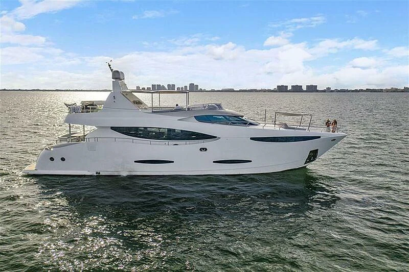 a white yacht in the water aboard ADAMO Yacht for Sale