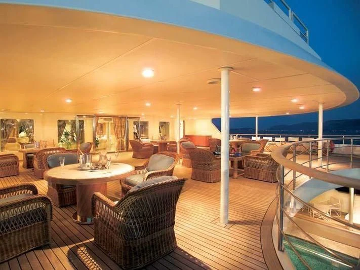 a large living room with a large balcony aboard ALEXANDER Yacht for Sale
