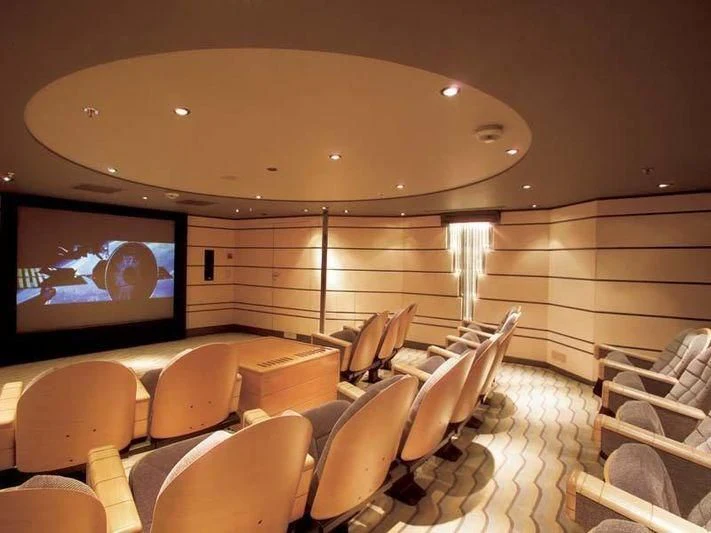 a room with chairs and a tv aboard ALEXANDER Yacht for Sale