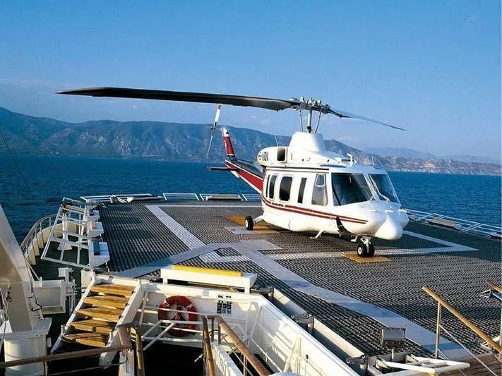 a helicopter on a deck aboard ALEXANDER Yacht for Sale