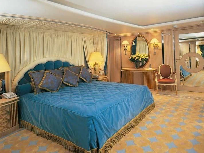 a large bedroom with a large bed aboard ALEXANDER Yacht for Sale