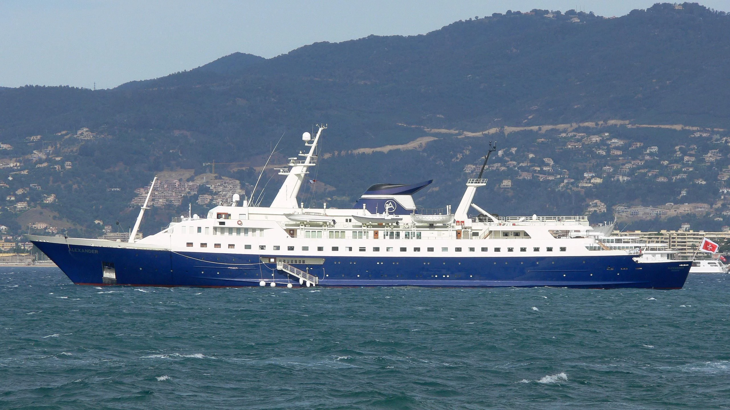 a large blue and white ship aboard ALEXANDER Yacht for Sale