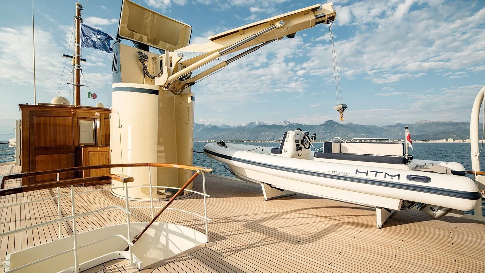 a boat docked at a pier aboard TARANSAY Yacht for Sale