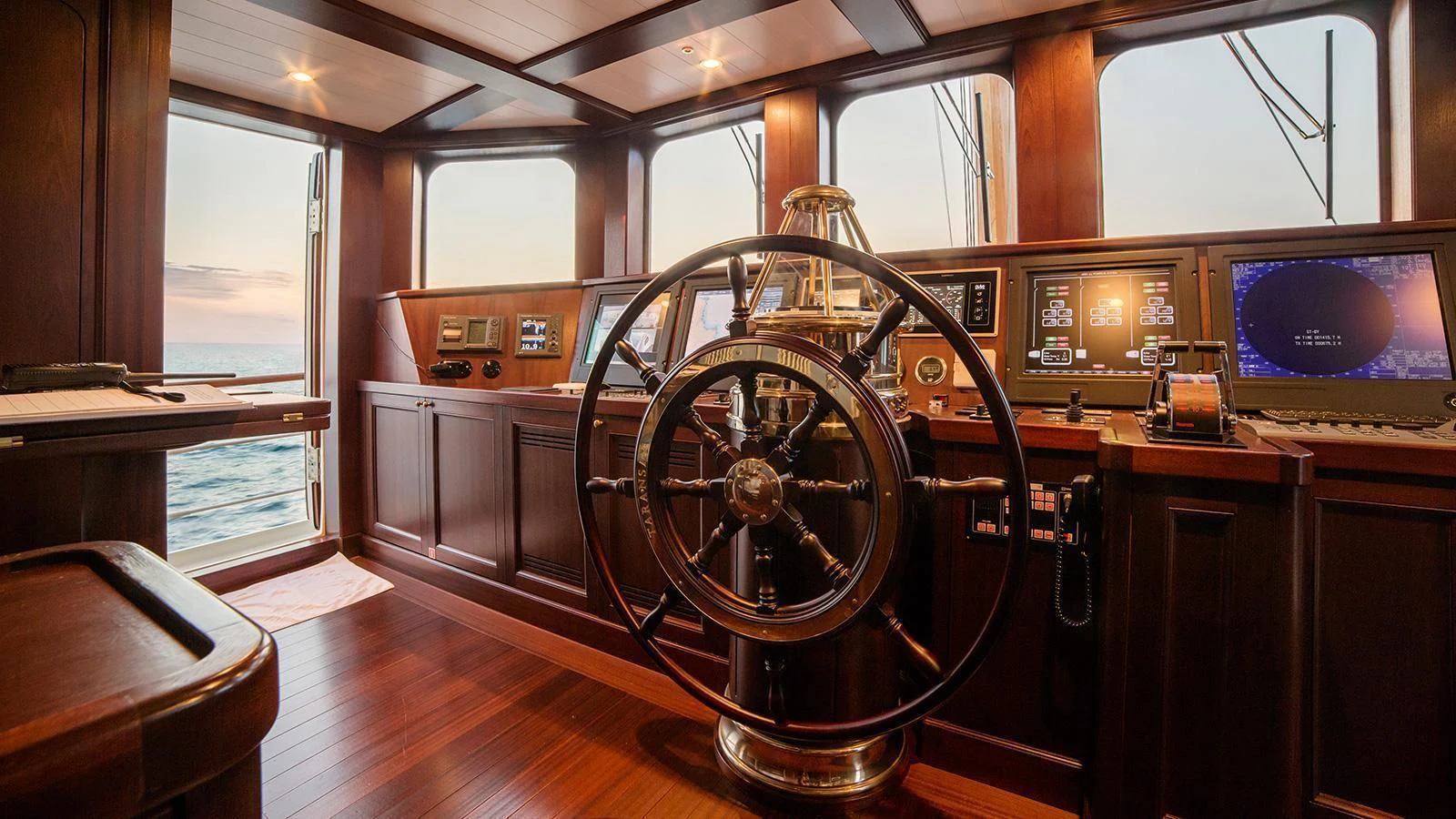 a room with a large wheel aboard TARANSAY Yacht for Sale