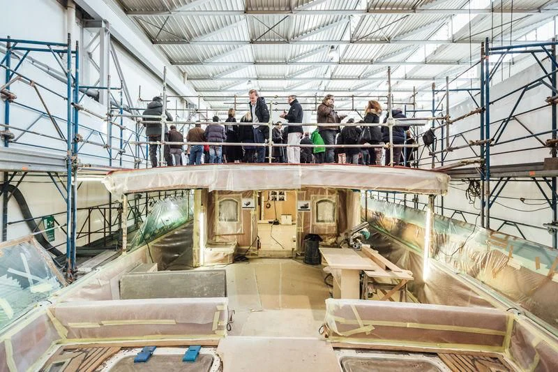 people standing in a factory aboard TARANSAY Yacht for Sale