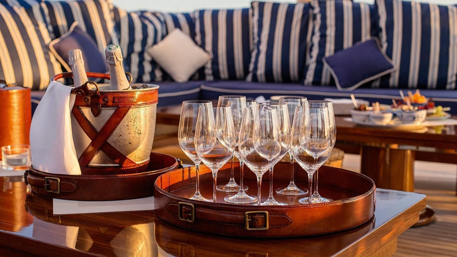 a group of wine glasses on a table aboard TARANSAY Yacht for Sale