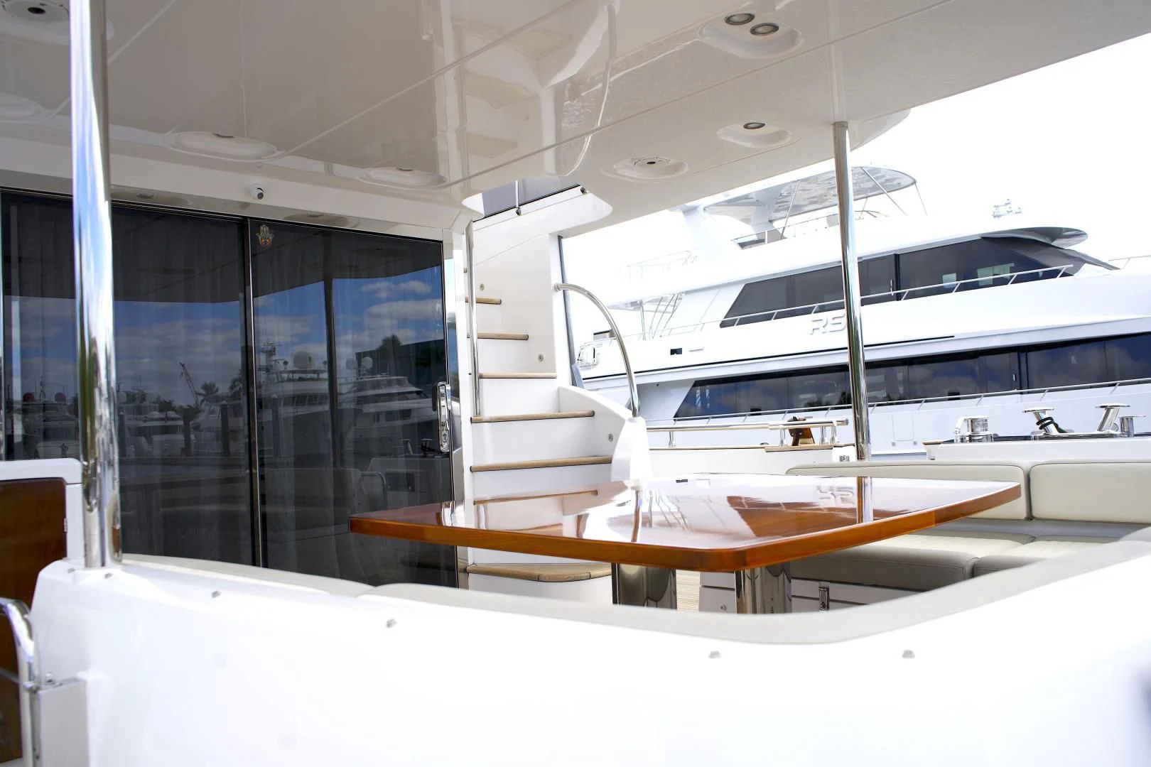 a white yacht in a room aboard RAINBOW GODDESS Yacht for Sale