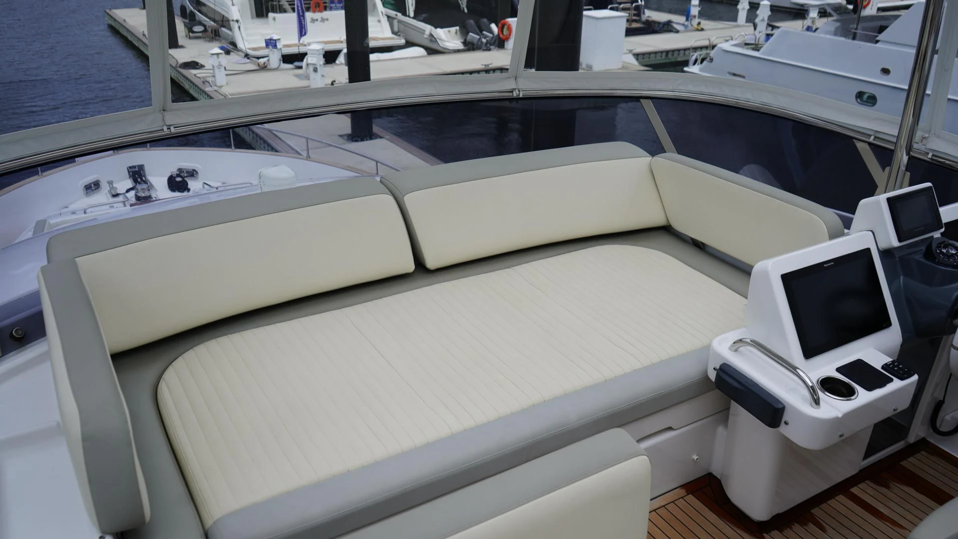 a boat with a screen and a monitor on the deck aboard RAINBOW GODDESS Yacht for Sale