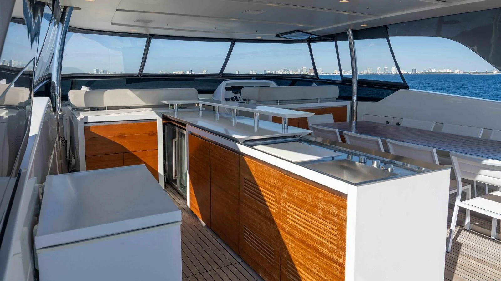 a room with a large window and a view of the water aboard 106 FLYBRIDGE Yacht for Sale