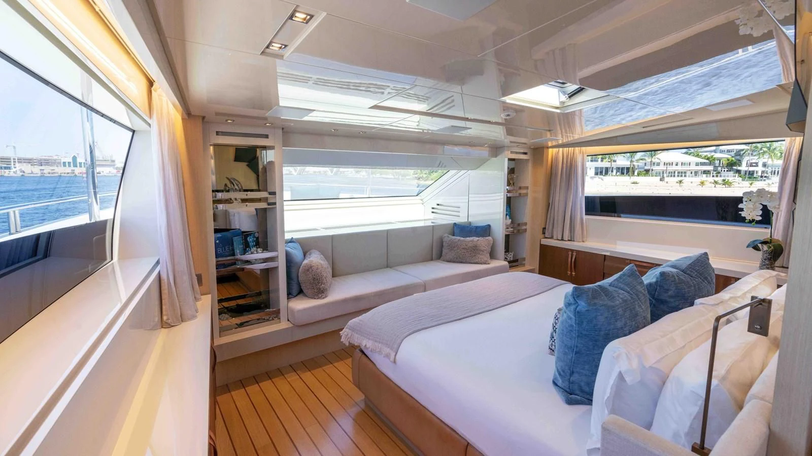 a room with a bed and a window aboard 106 FLYBRIDGE Yacht for Sale