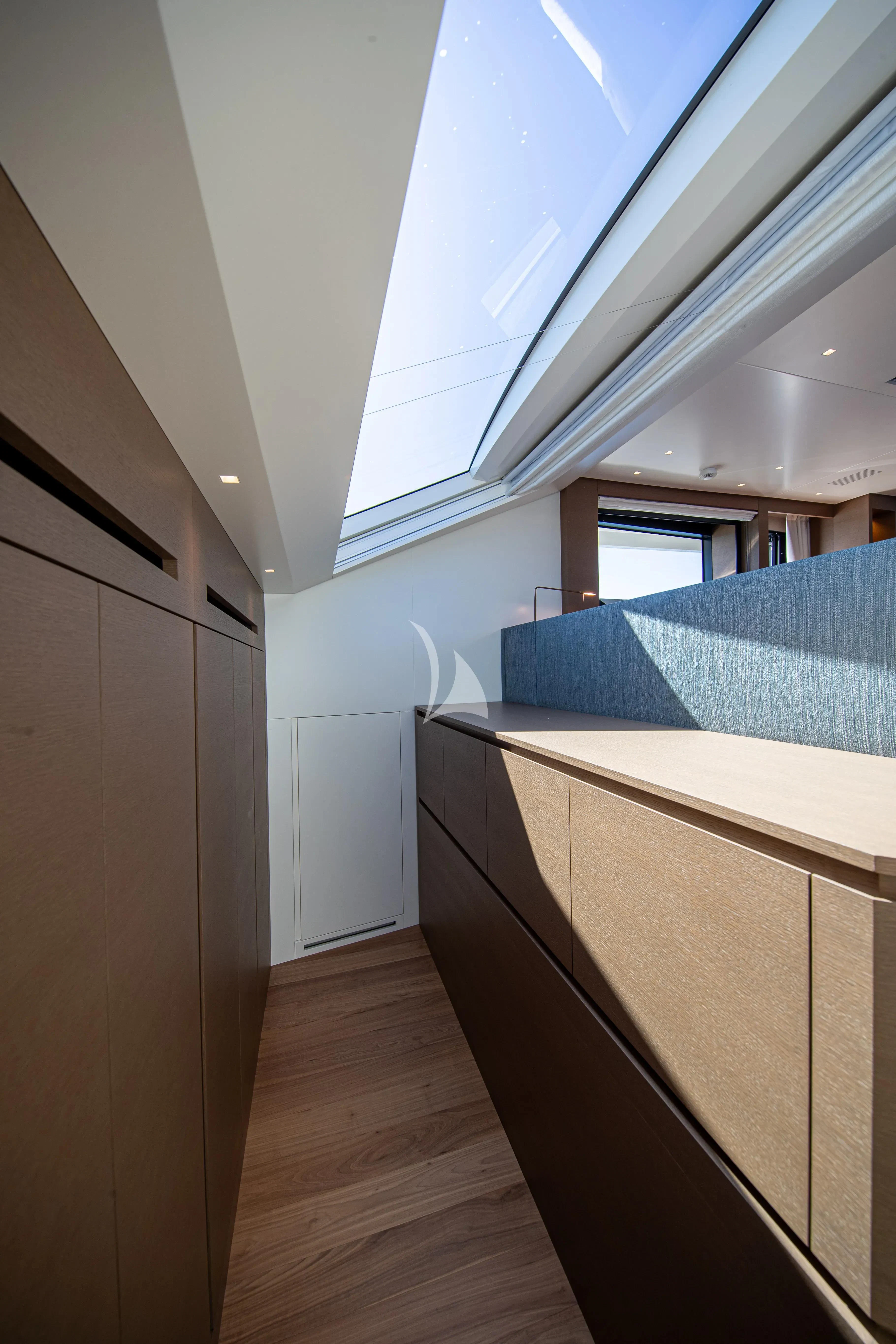 a room with a bed and a window aboard SSL Yacht for Sale