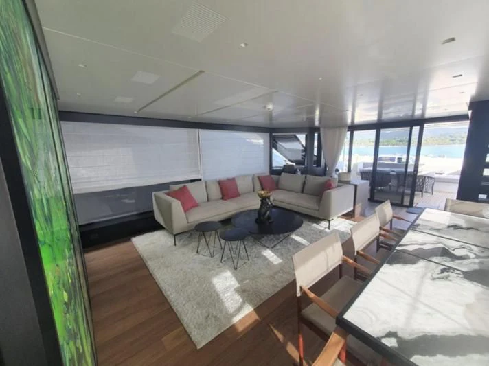 a living room with a large window aboard SSL Yacht for Sale