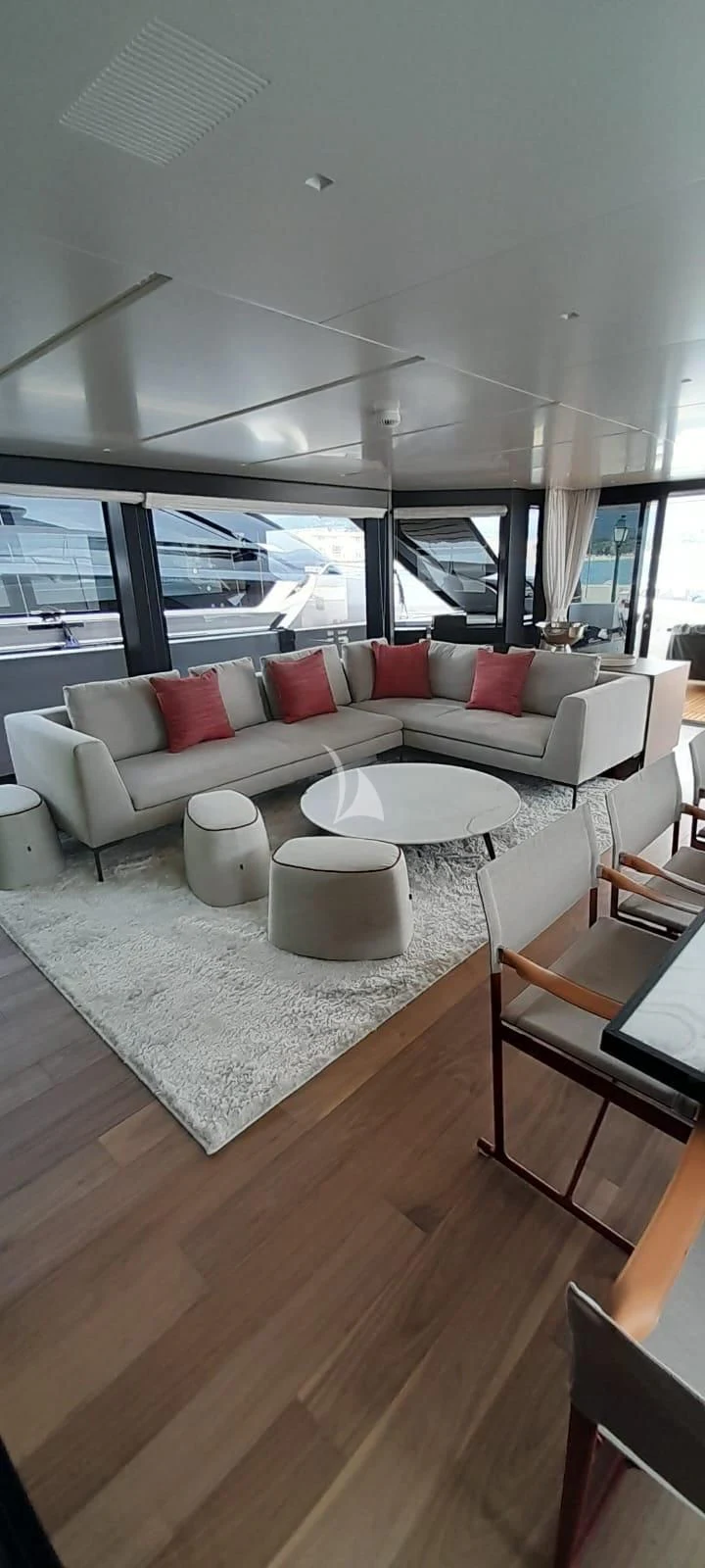a living room with a large window aboard SSL Yacht for Sale