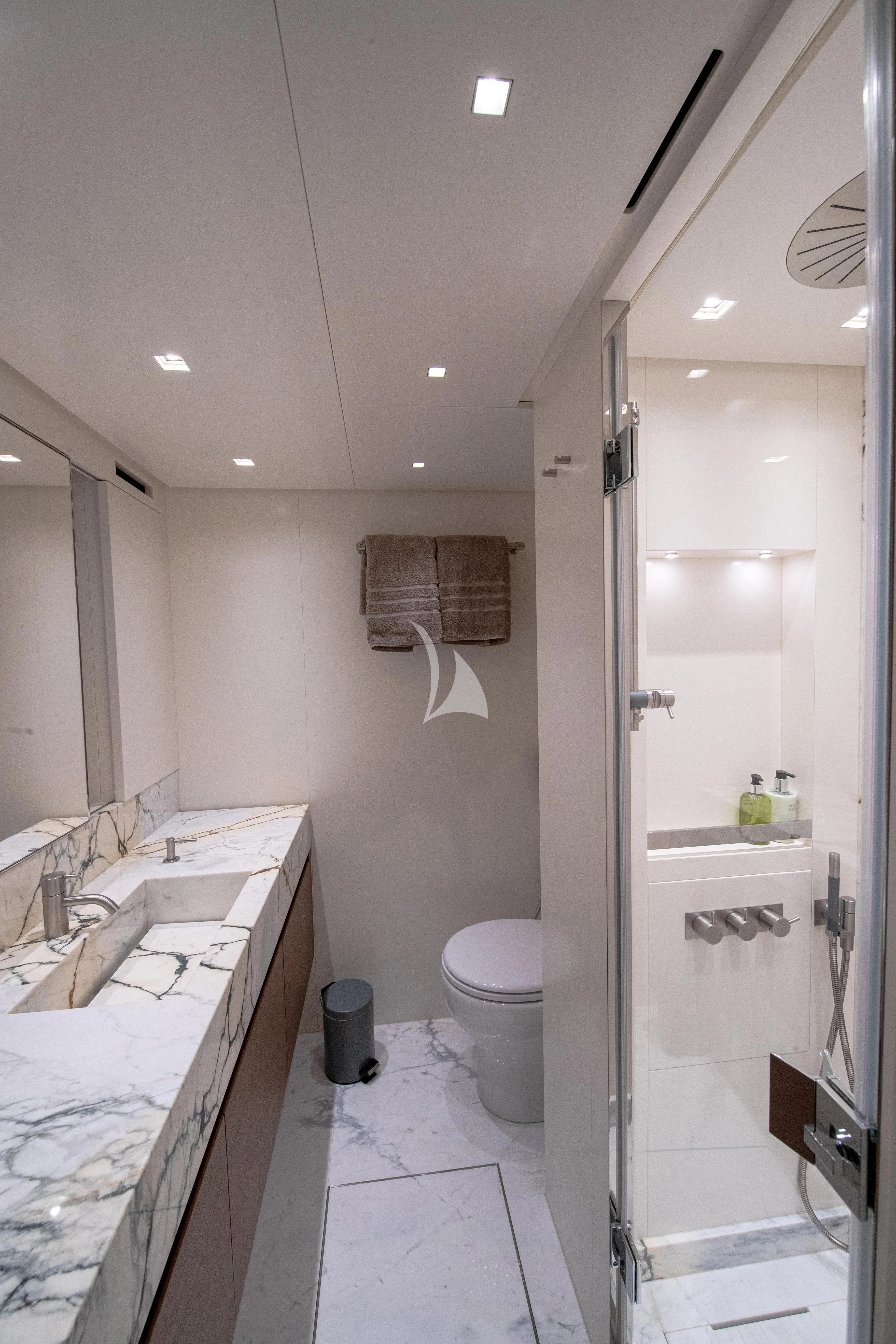 a bathroom with a shower and sink aboard SSL Yacht for Sale