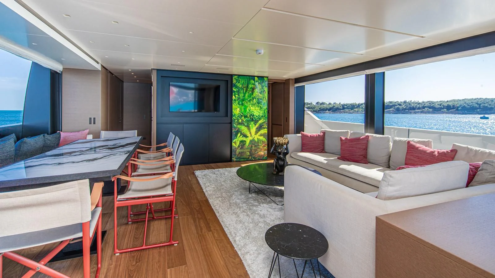 a living room with a couch and a tv aboard SSL Yacht for Sale