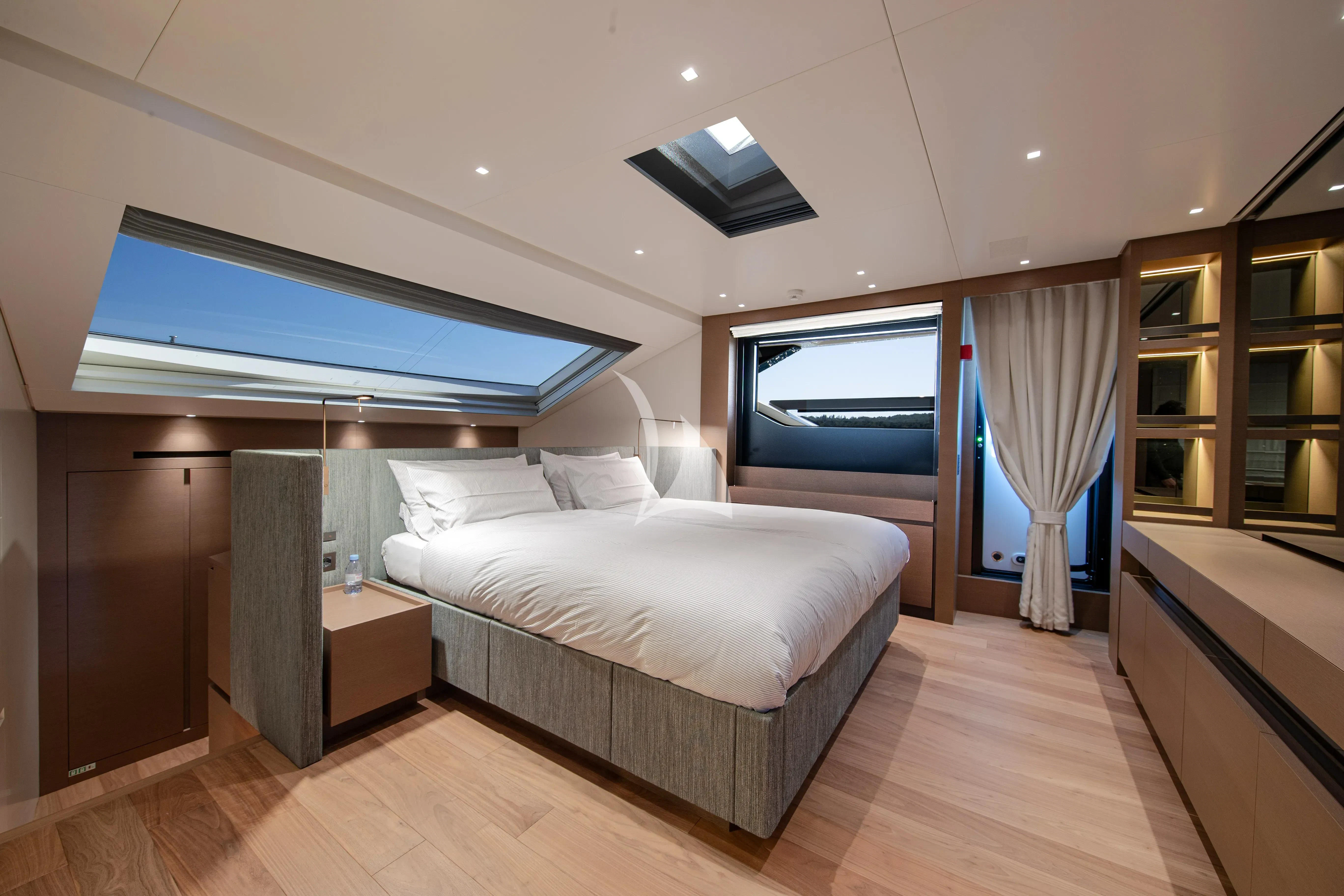 a large bed in a room aboard SSL Yacht for Sale