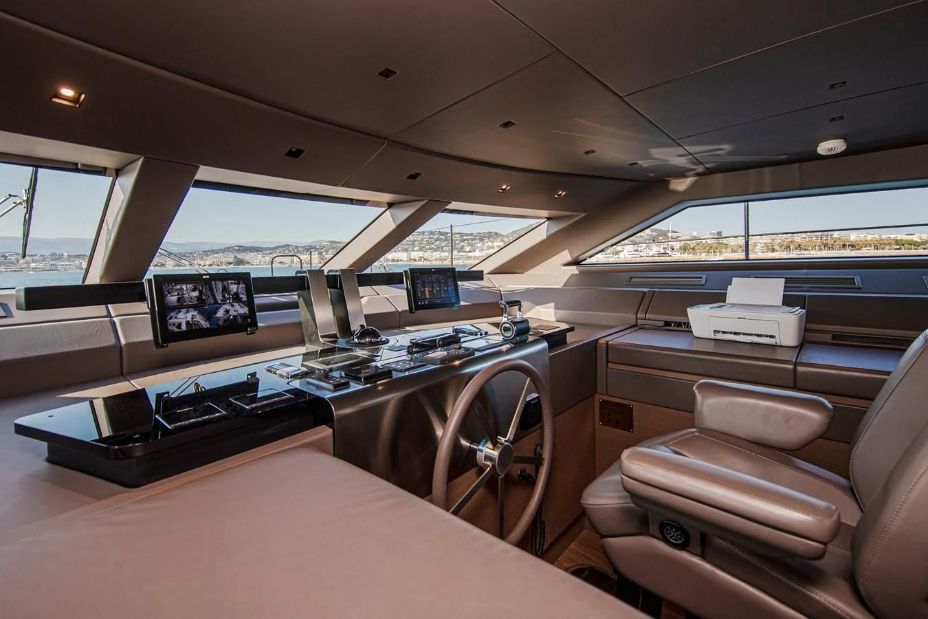 a room with a desk and computer aboard SSL Yacht for Sale