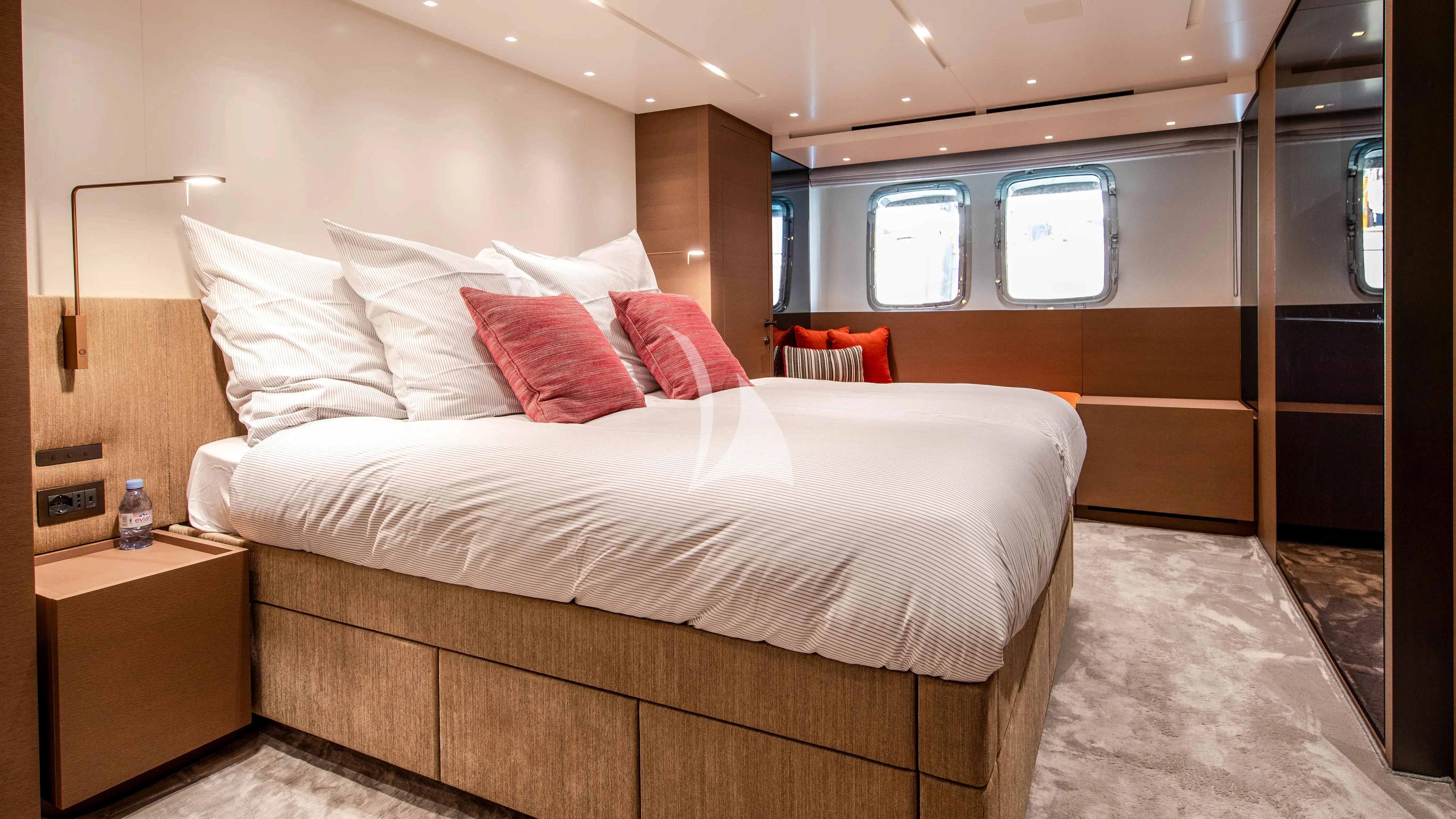a bed in a room aboard SSL Yacht for Sale
