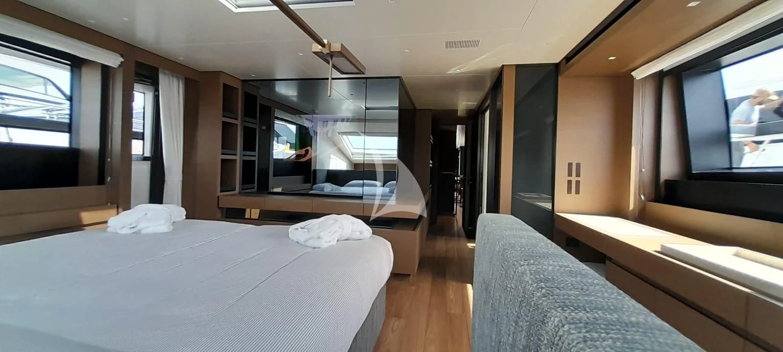 a room with a bed and a tv aboard SSL Yacht for Sale