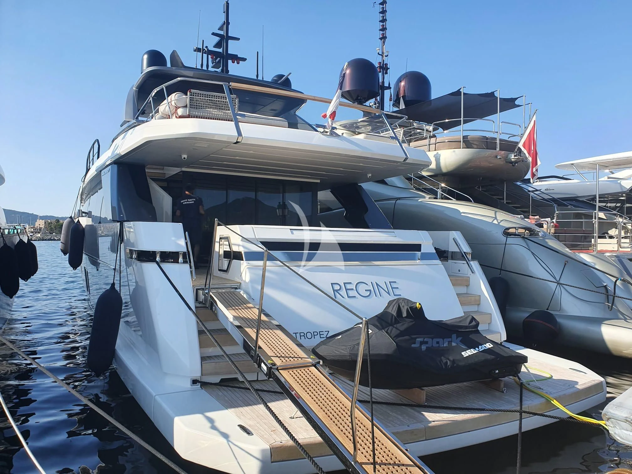 a boat docked at a pier aboard SSL Yacht for Sale