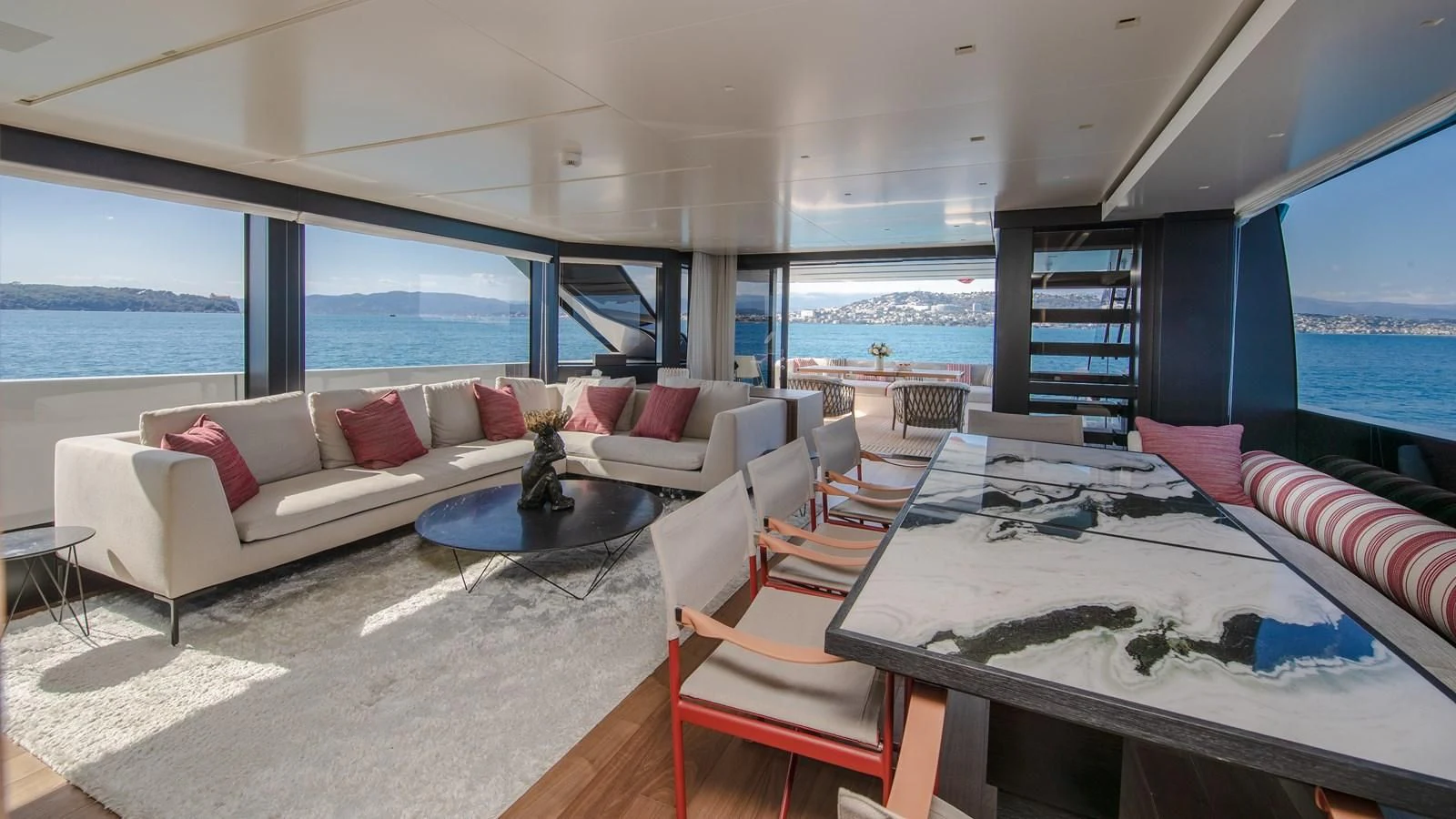 a living room with a large window aboard SSL Yacht for Sale