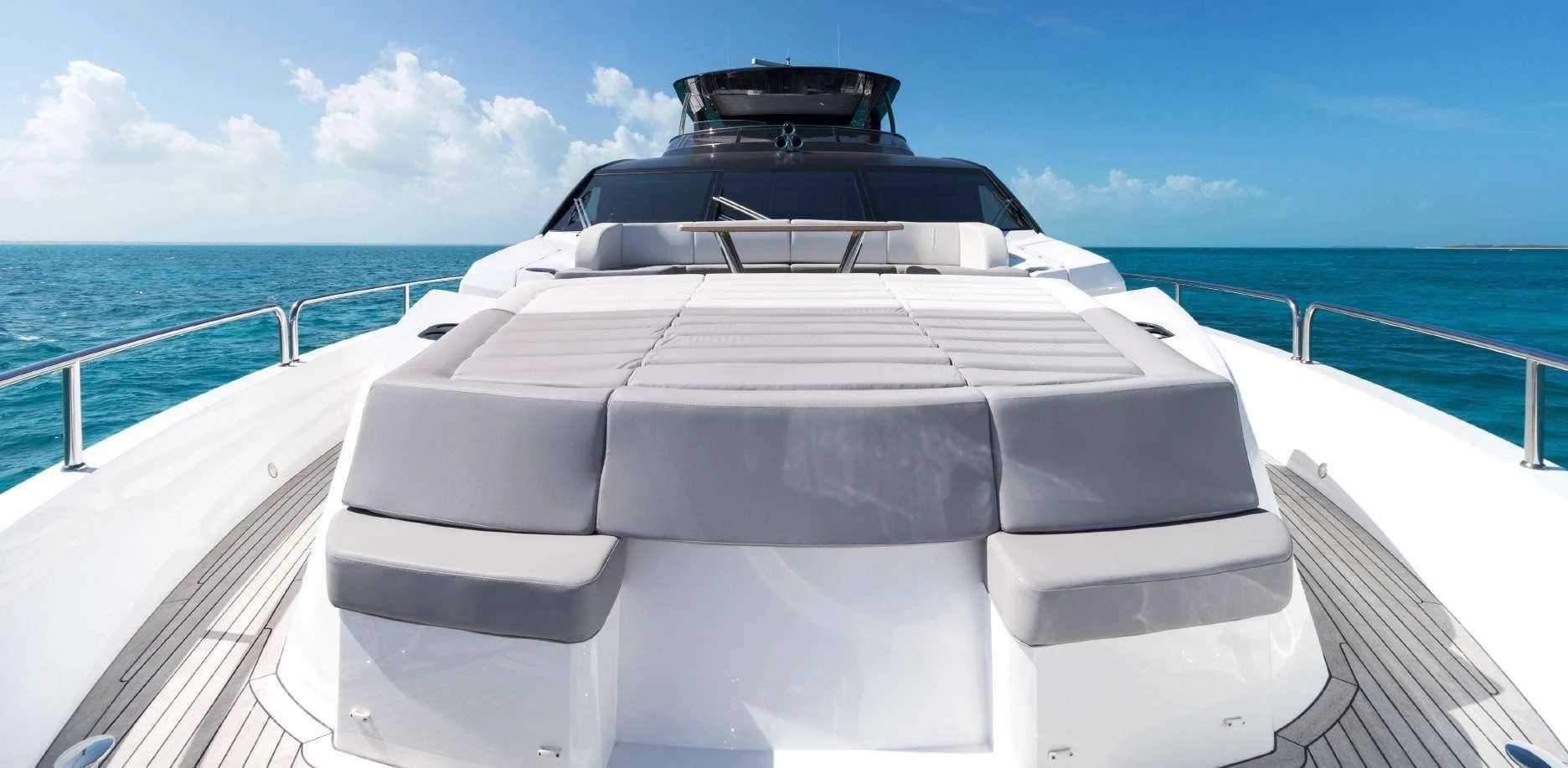 a white boat on a boat aboard SYNERGY Yacht for Sale