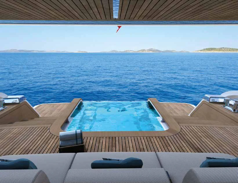 a deck with a pool and a view of the water aboard ENZO Yacht for Sale