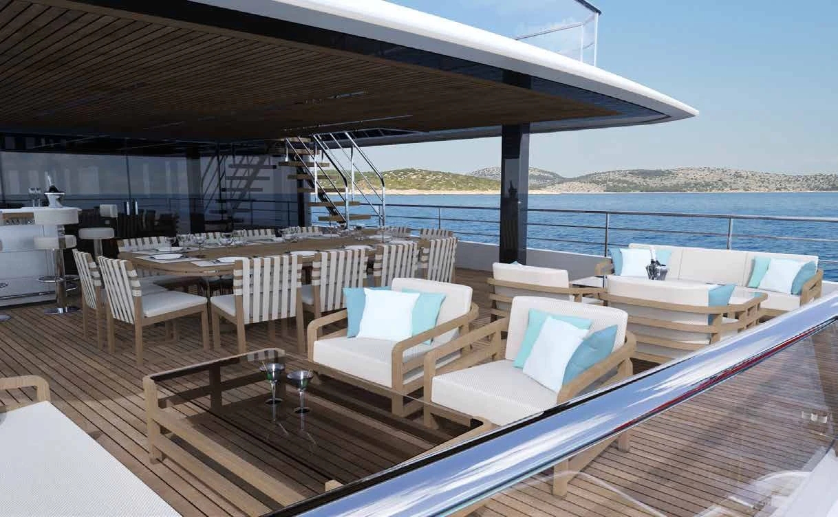 a deck with a view of the ocean and the land aboard ENZO Yacht for Sale