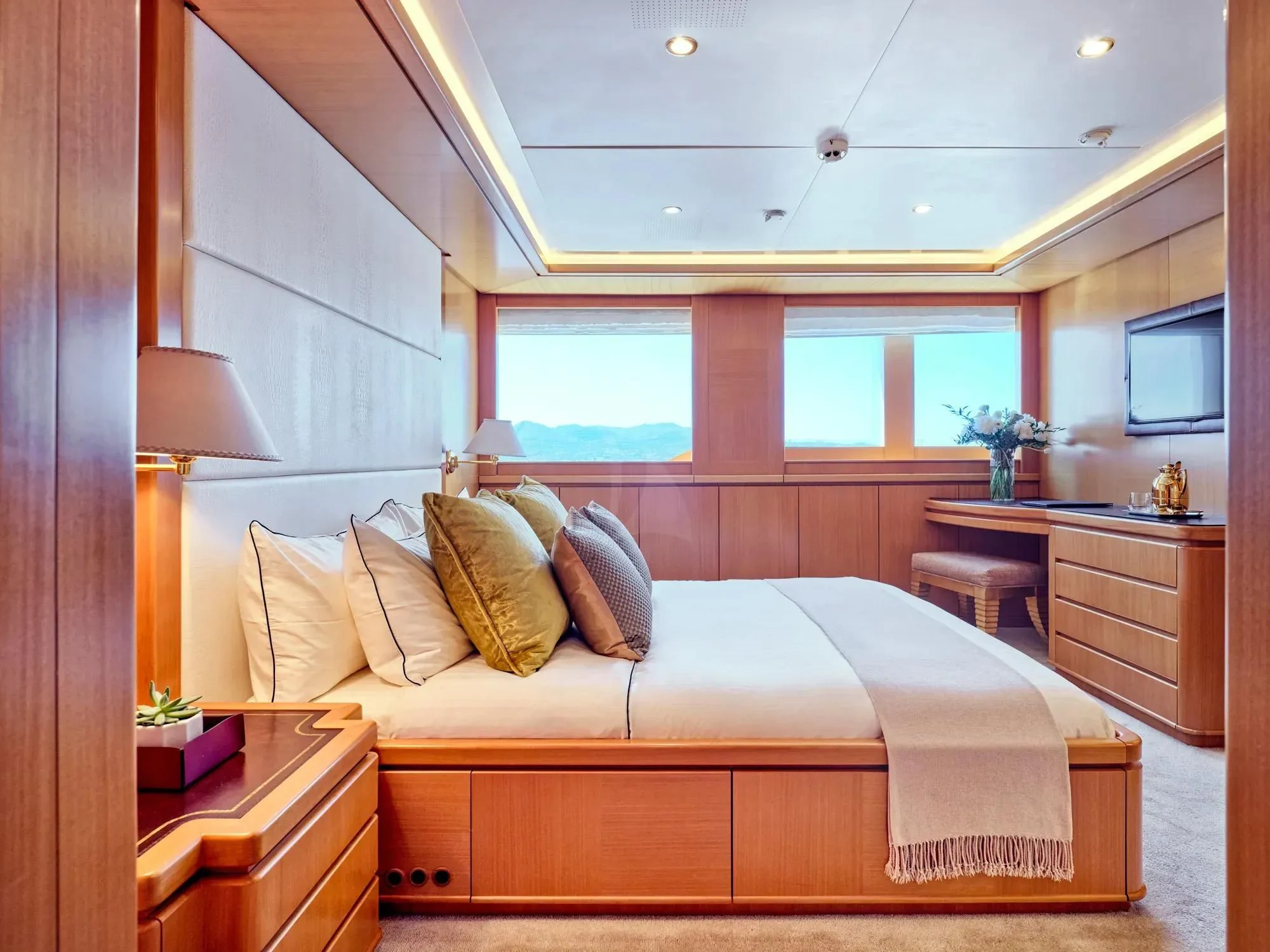 a bed in a room aboard OASIS Yacht for Sale