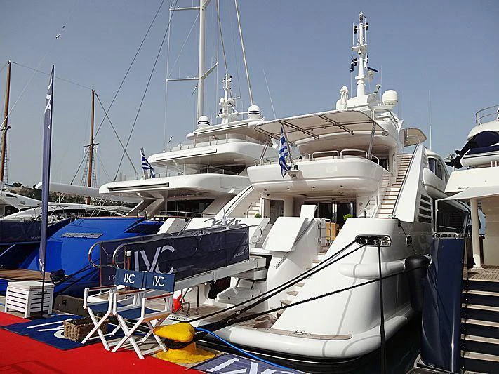 a boat docked at a pier aboard OASIS Yacht for Sale