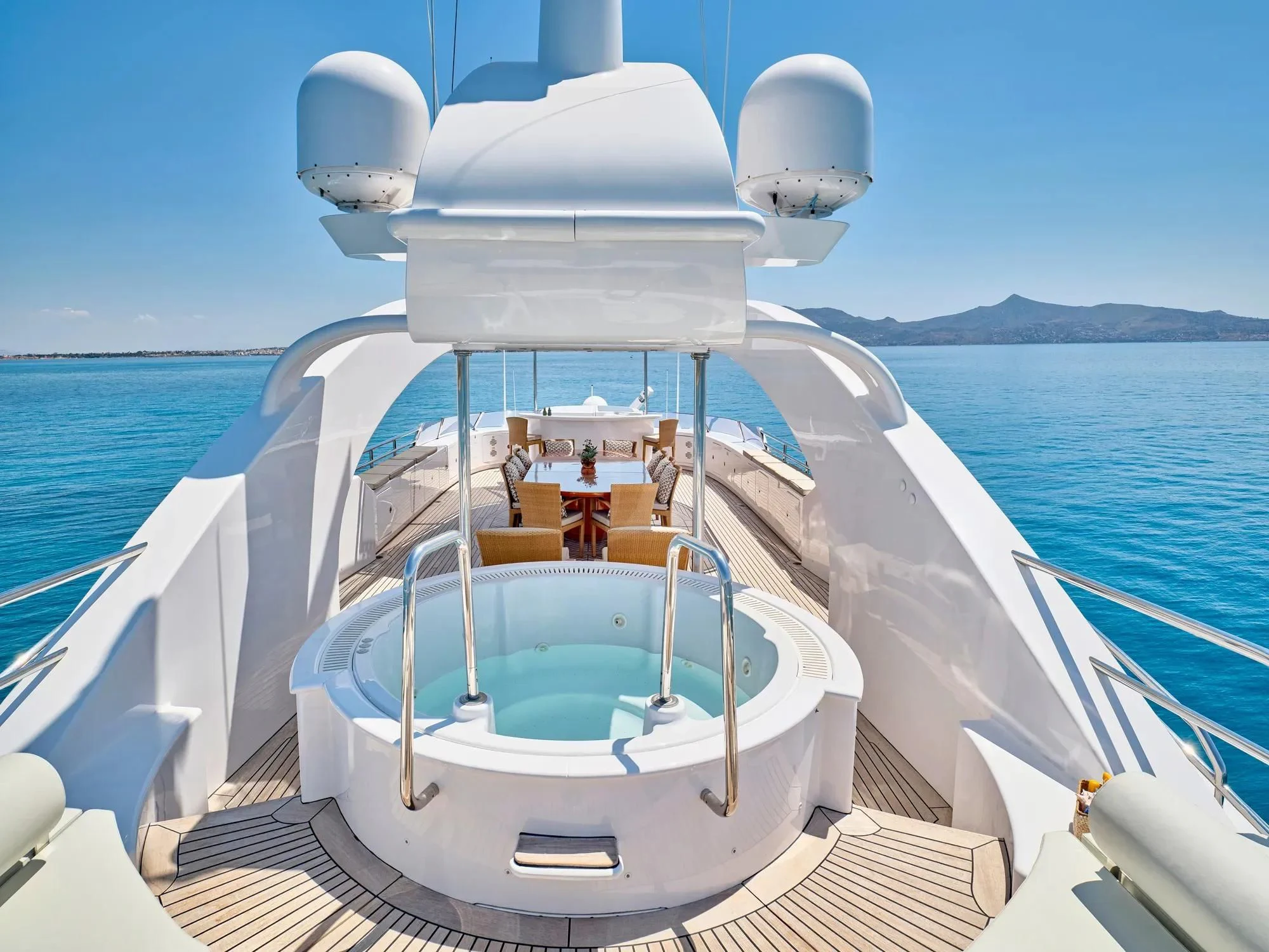 a boat with a person on the front aboard OASIS Yacht for Sale