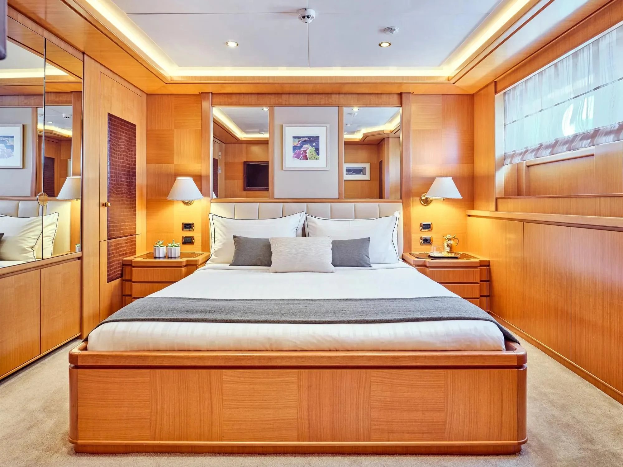a bed in a hotel room aboard OASIS Yacht for Sale