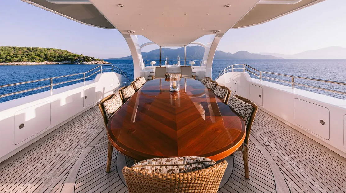 a table on a boat aboard OASIS Yacht for Sale