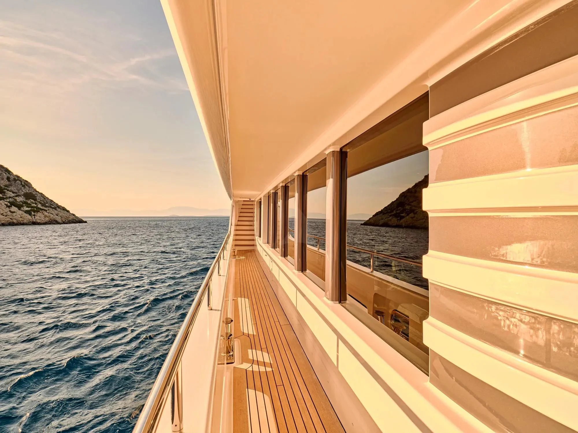 a large balcony overlooking the ocean aboard OASIS Yacht for Sale