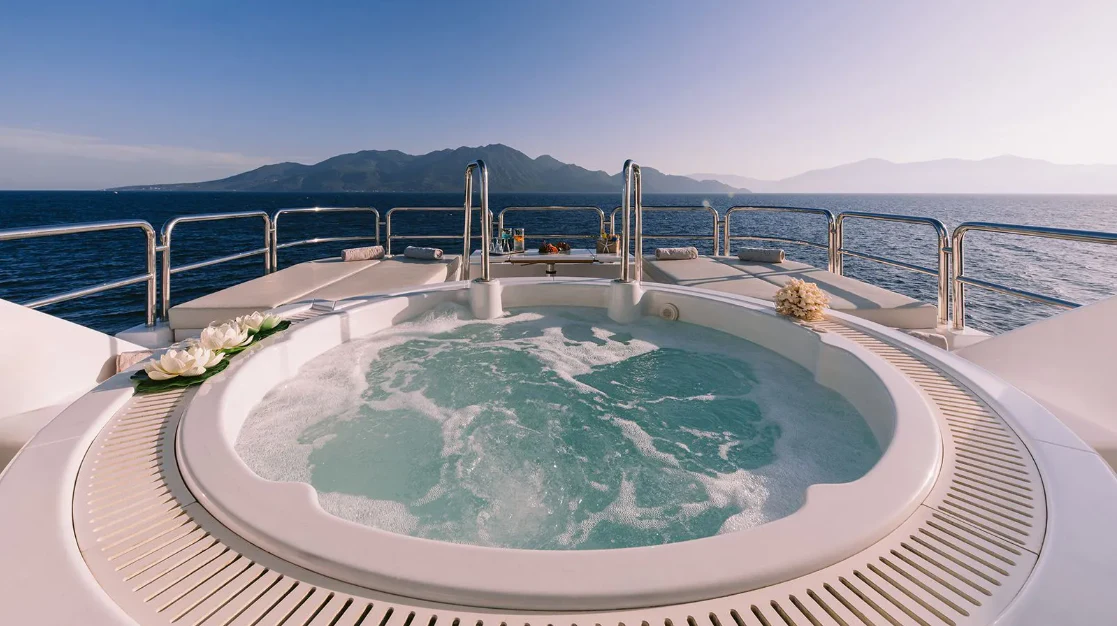 a swimming pool on a balcony aboard OASIS Yacht for Sale