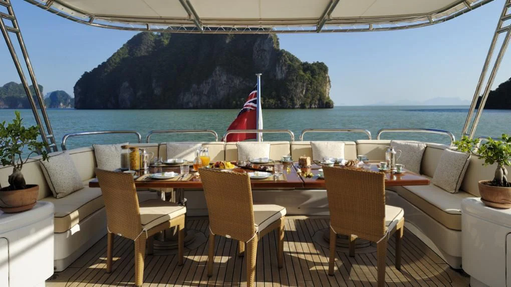 a table on a boat aboard OASIS Yacht for Sale