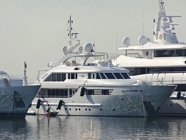 a group of boats in the water aboard OASIS Yacht for Sale
