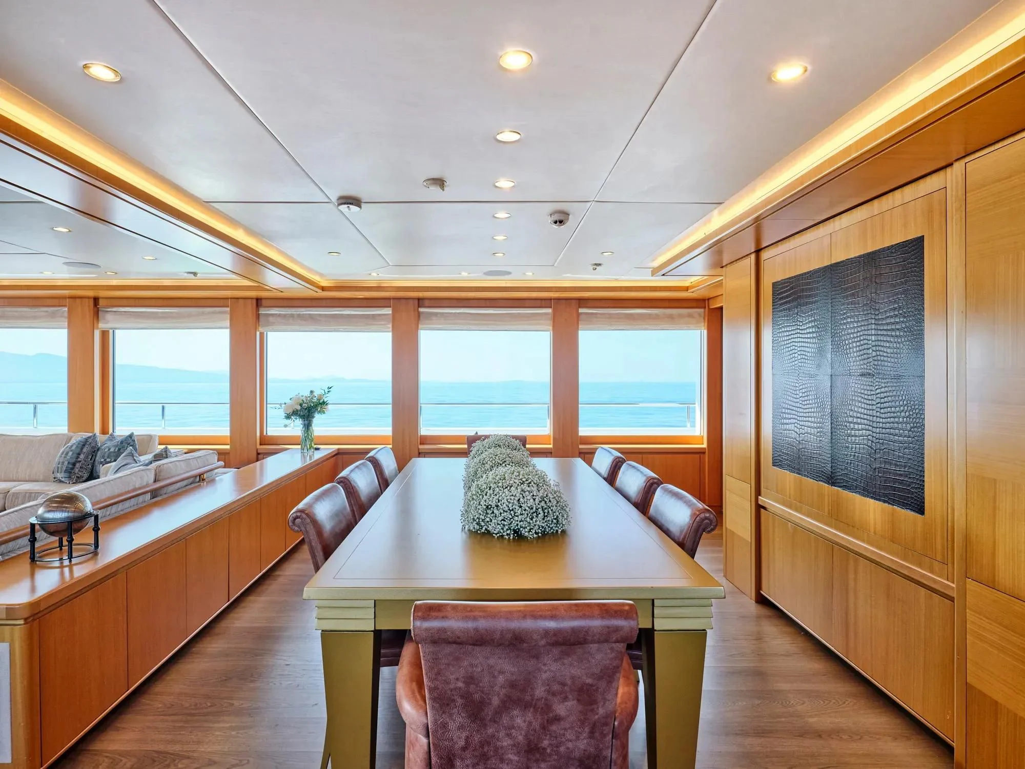 a large kitchen with a large window aboard OASIS Yacht for Sale
