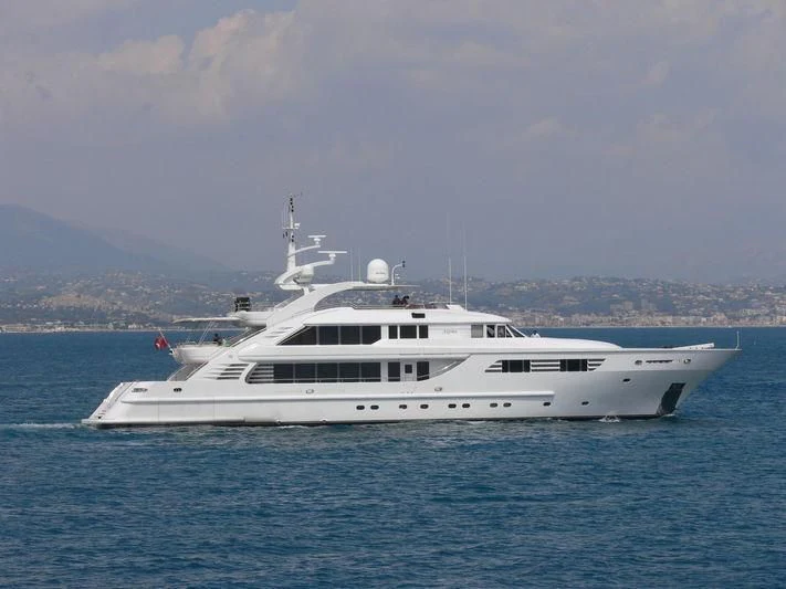 a white boat in the water aboard OASIS Yacht for Sale